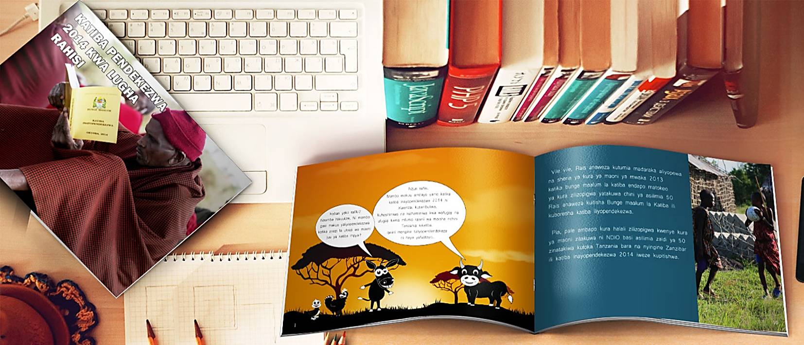 books, keyboard, catalogue, pencils on besk