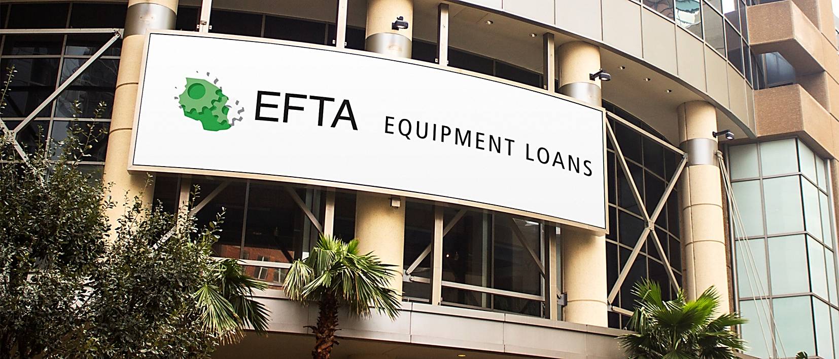 large efta sign on building with palm trees